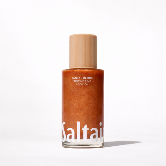 Kimaltava vartaloöljy – kosteuttava glow oil vartalolle, kultainen hehku (Santal Bloom)