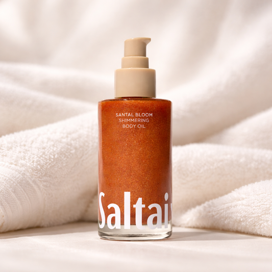 Kimaltava vartaloöljy – kosteuttava glow oil vartalolle, kultainen hehku (Santal Bloom)